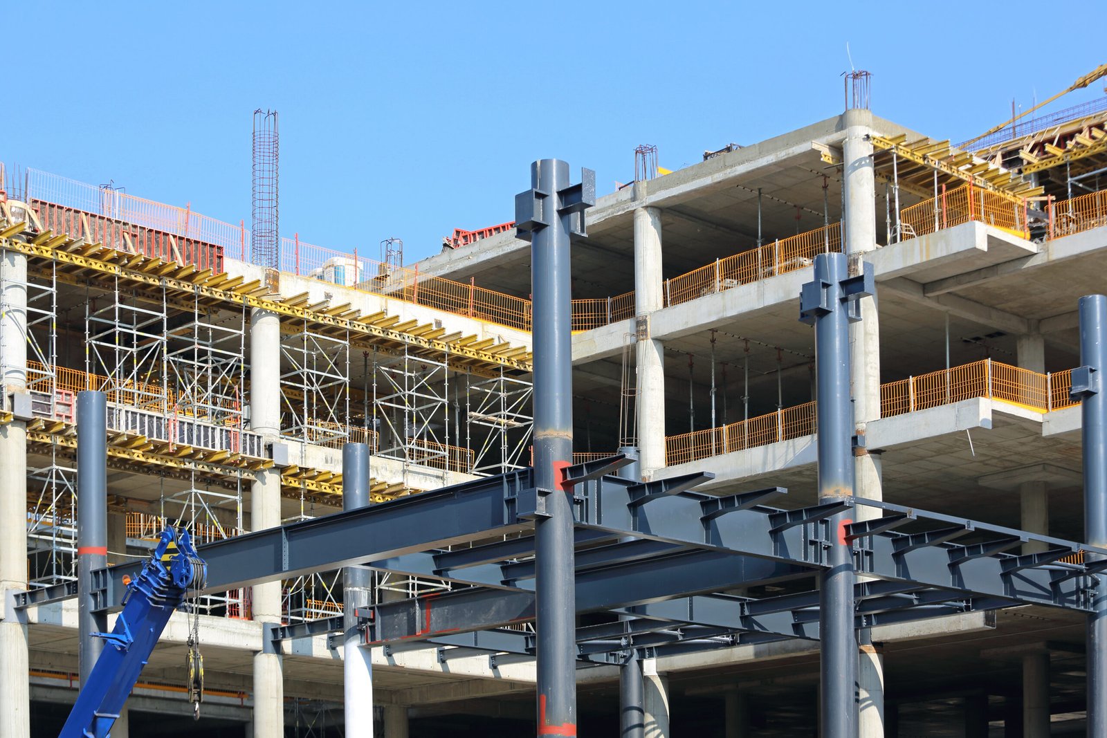 gray-steel-construction-framework-against-blue-sky-2026-03-25-22-57-03-utc