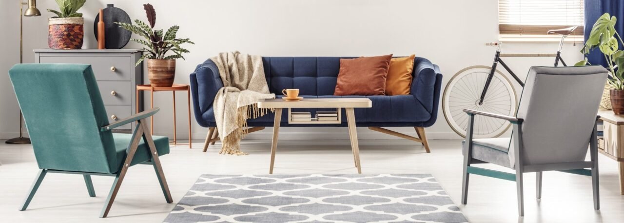 real-photo-of-green-and-gray-armchairs-standing-next-to-a-patter.jpg